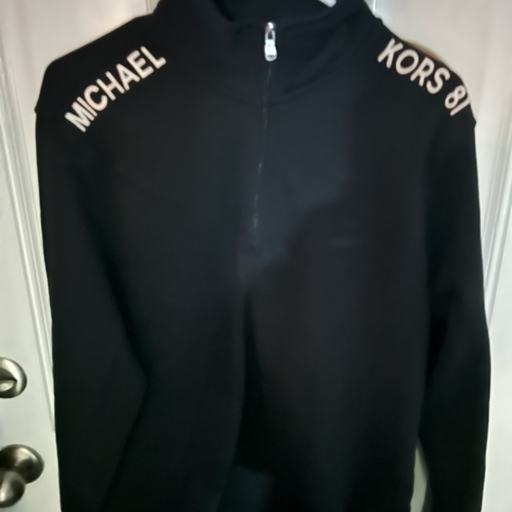 Brand new never worn Micheal Kors quarter zip size large.